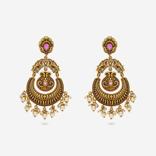 Antique temple earrings with ruby-red stones and pearl drops, front view.