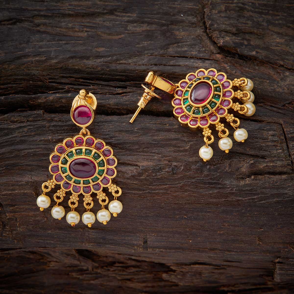 Kushal's Fashion Jewellery - Jhumka Earring with Peacock stud with Antique  Gold Polish and Ruby Green coloured stones and Pearl drops. #antique #pearl  #jewellery Design No: 81036rg Buy Online at: https://www.kushals .com/collections/antique-earrings |
