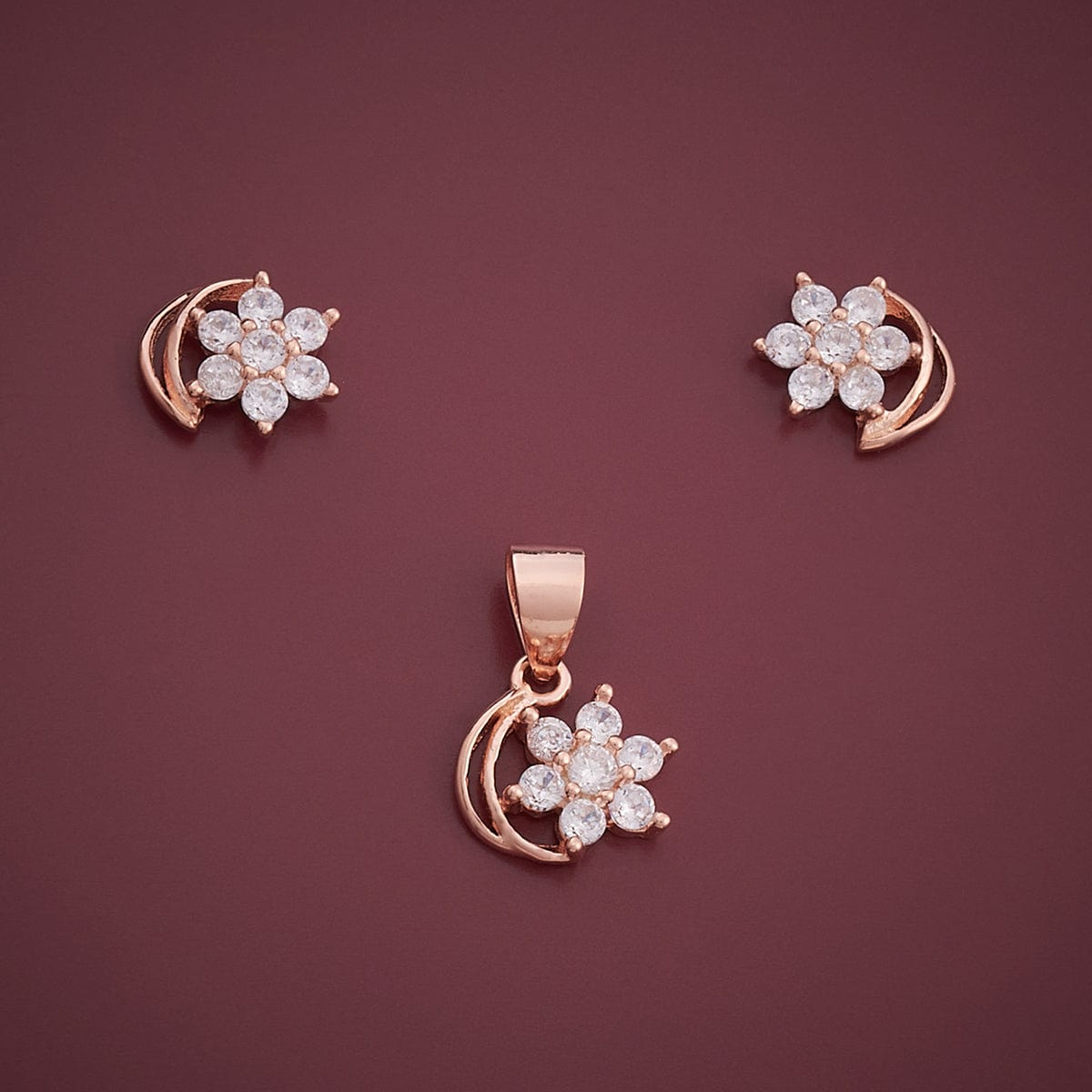 Buy quality Rose gold fancy flower design pendant with earrings set in  Ahmedabad