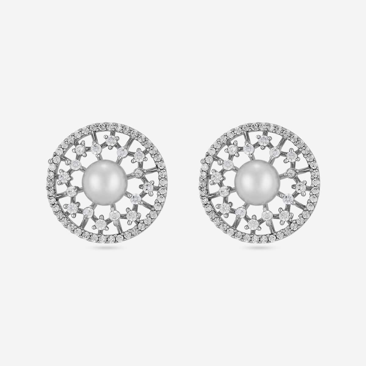 White zircon and pearl stud earrings with floral design, front view.