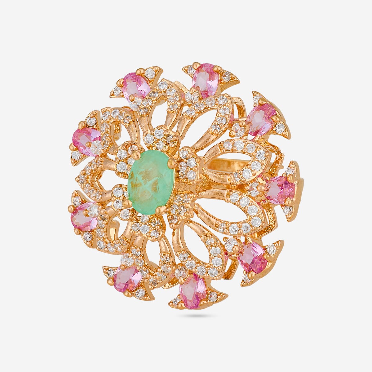 Gold-tone finger ring with green center stone and pink accents, top view.