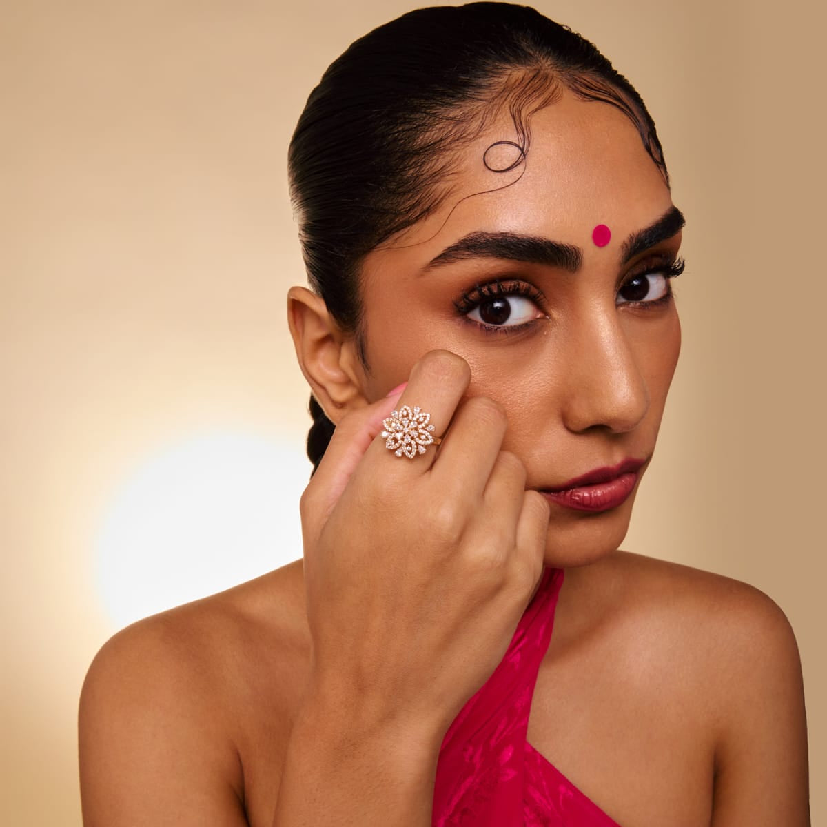 Zircon finger ring with white stones, gold-tone, worn by model.