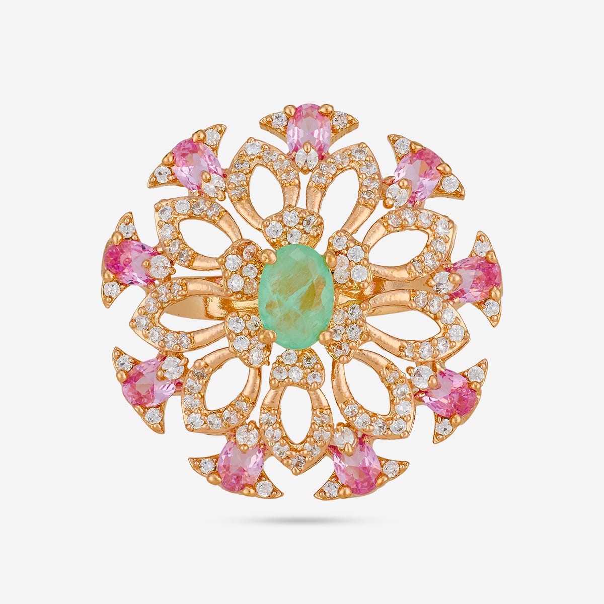 Gold-tone finger ring with green center stone and pink accents, front view.