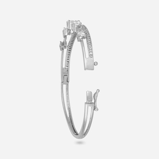 Silver-tone zircon kada with white stones, open clasp side view.