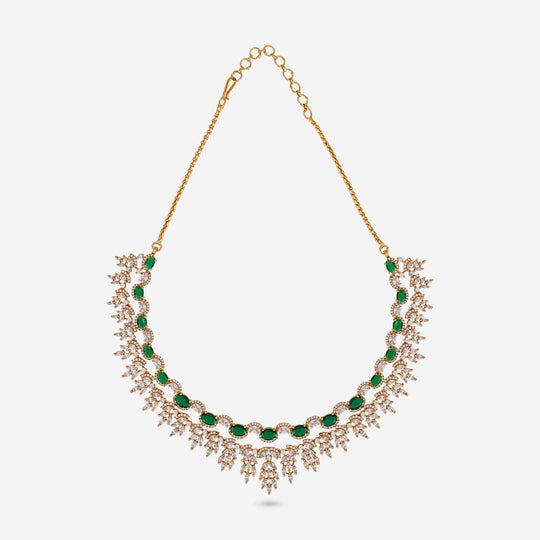 Green zircon collar necklace with gold-tone chain on white background.
